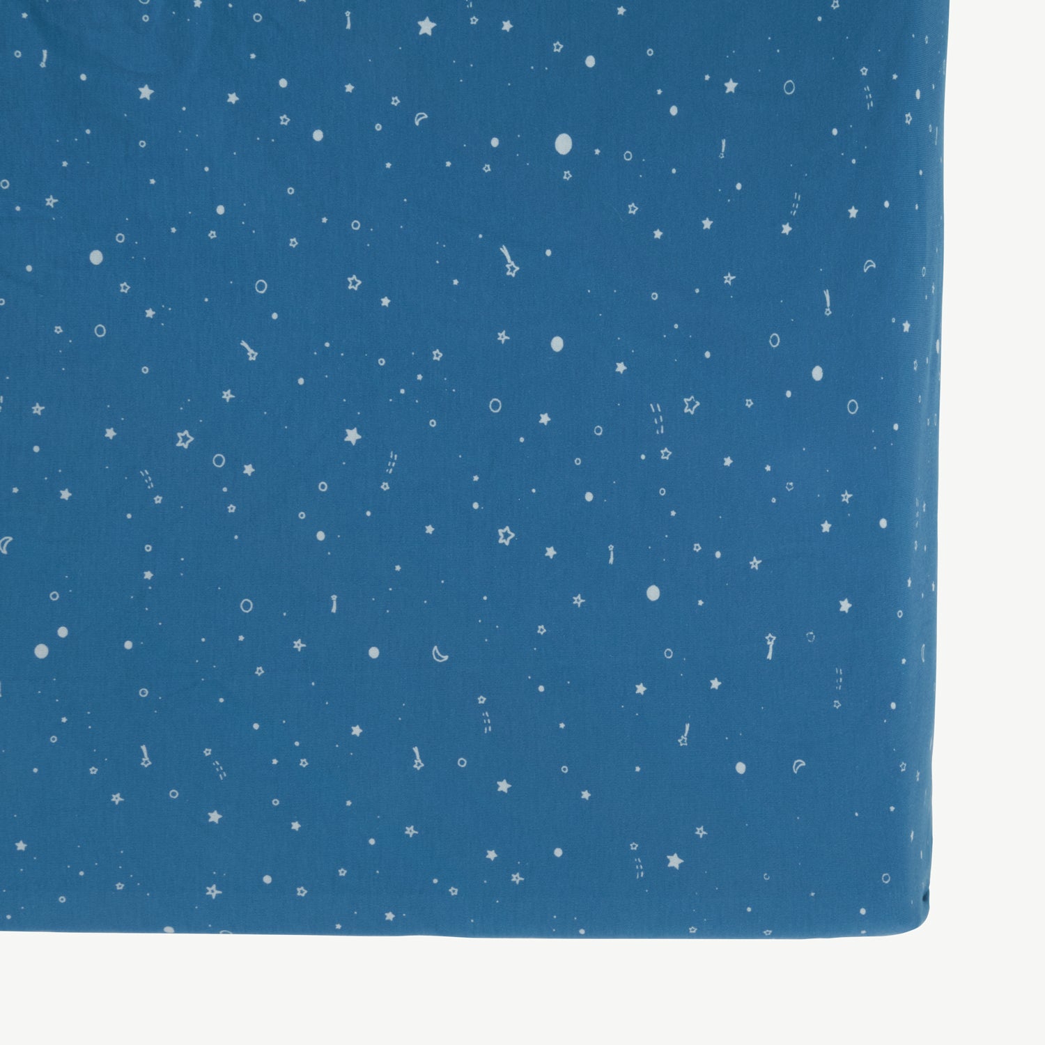 close to the stars' dark blue cribsheet